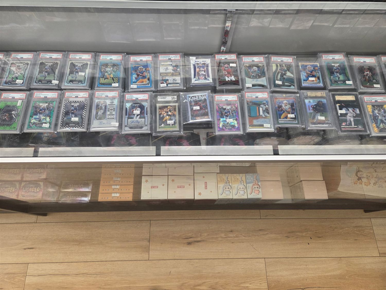 Football slab case — graded rookies and autos