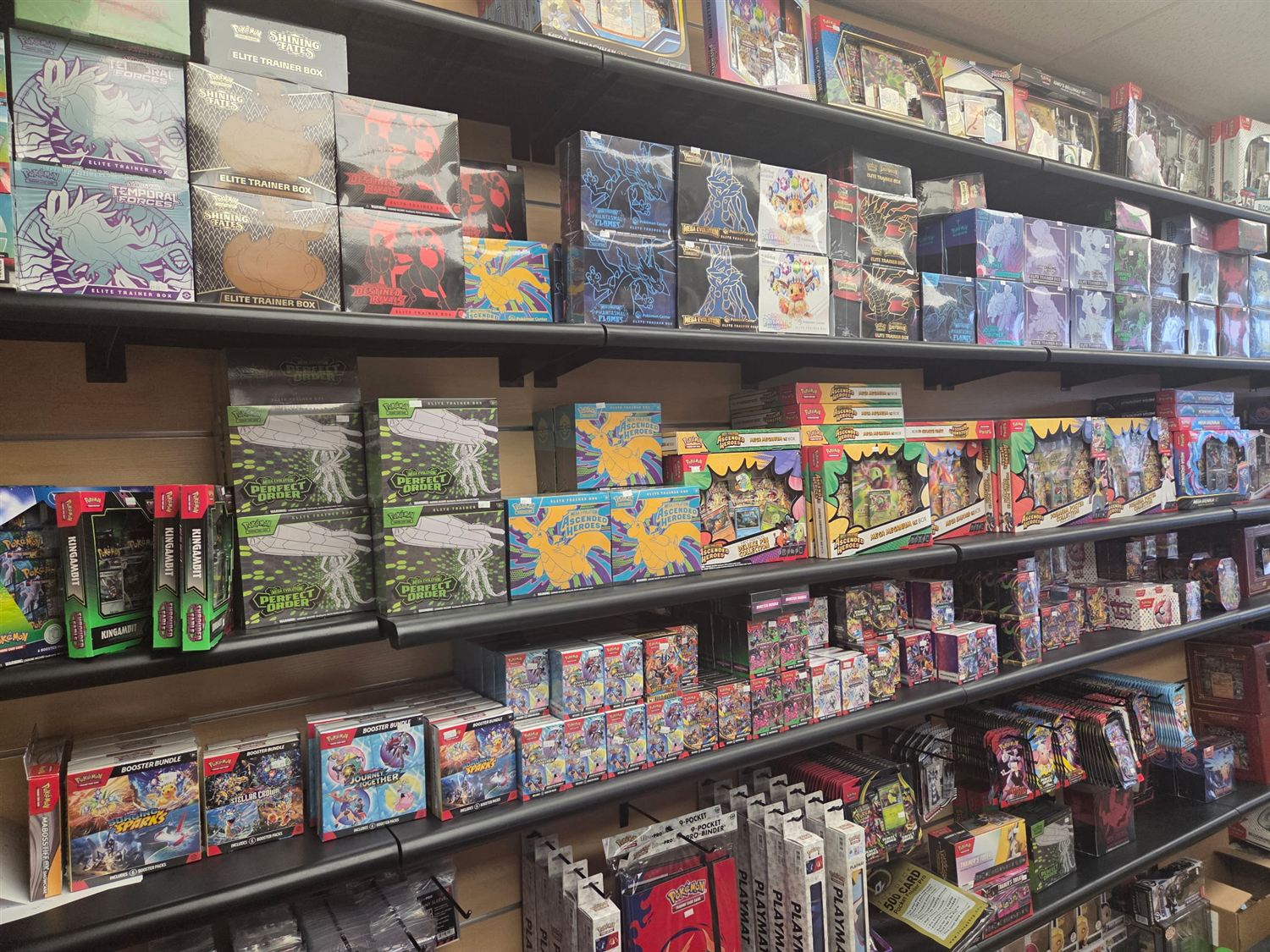 More sealed Pokémon — ETBs, booster bundles, tins and blisters