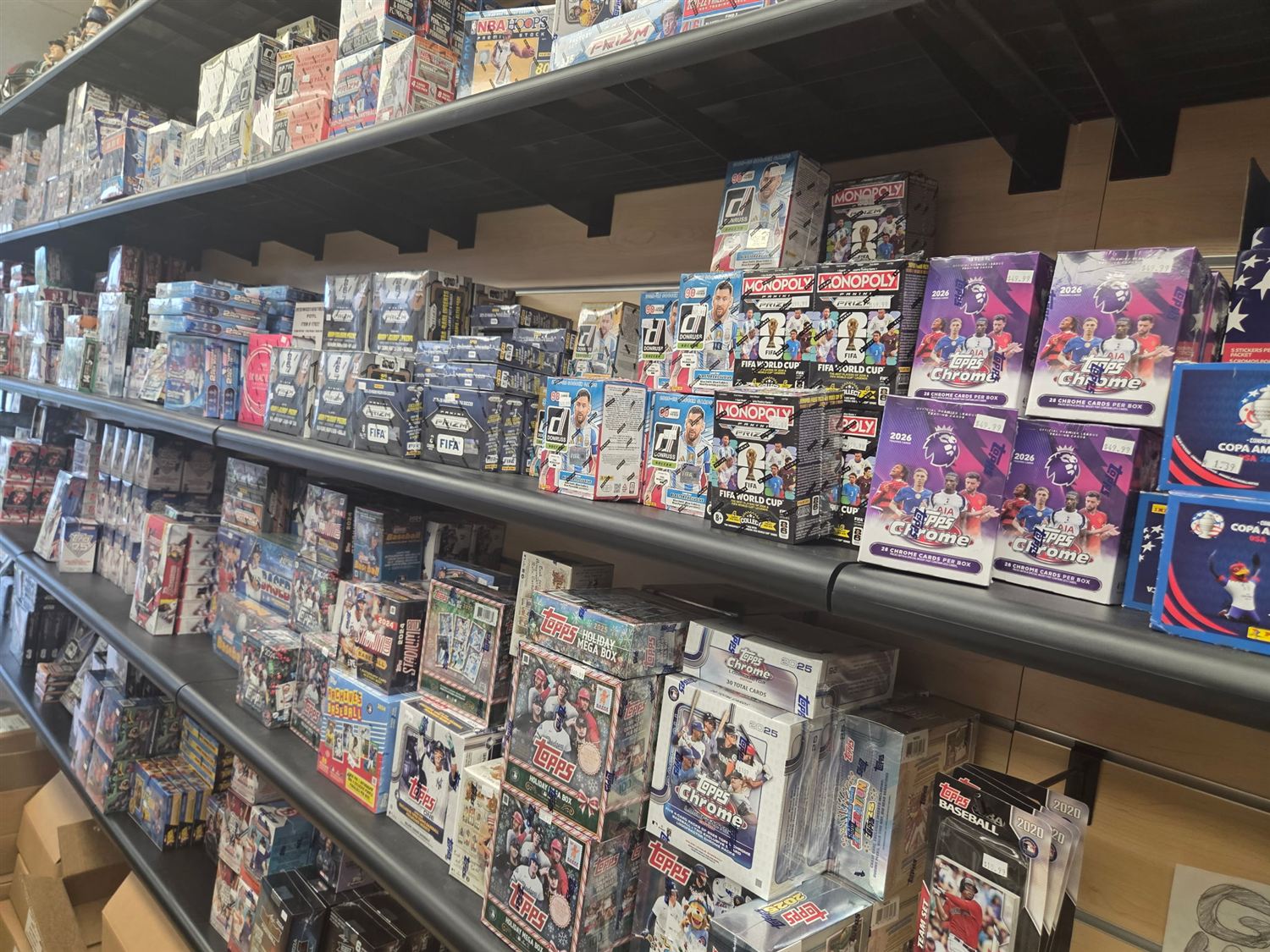 Soccer and baseball shelves — FIFA World Cup, Topps Chrome and Copa América